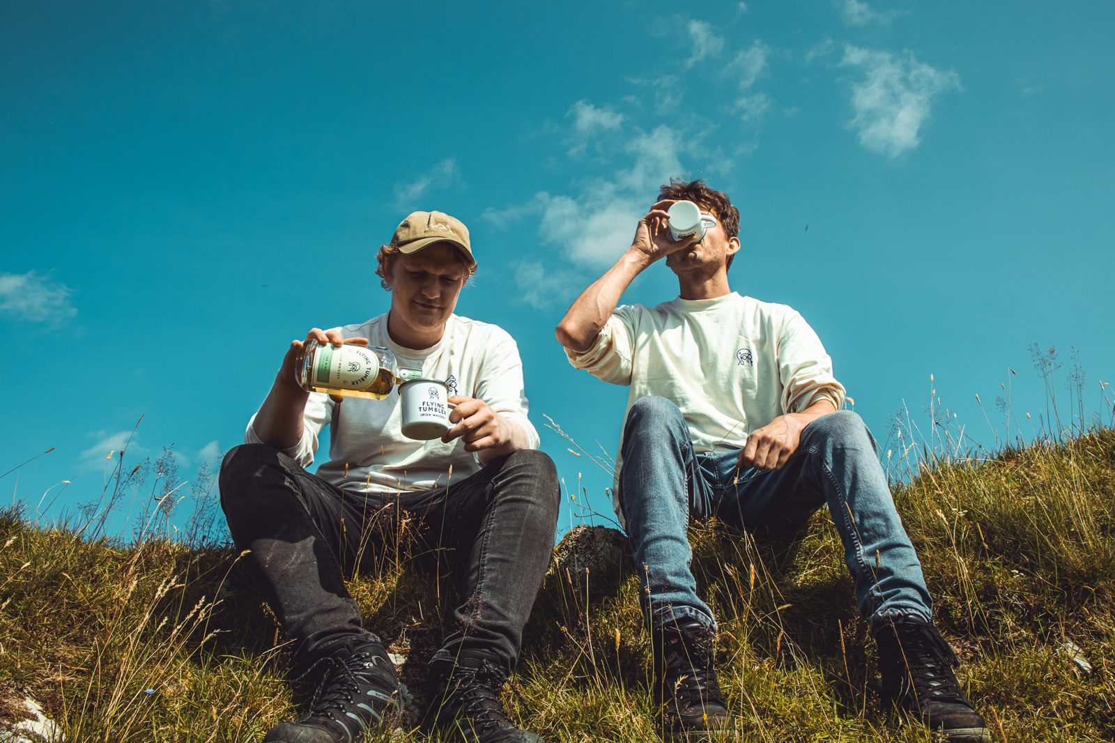 A crew sharing a dram on the hill